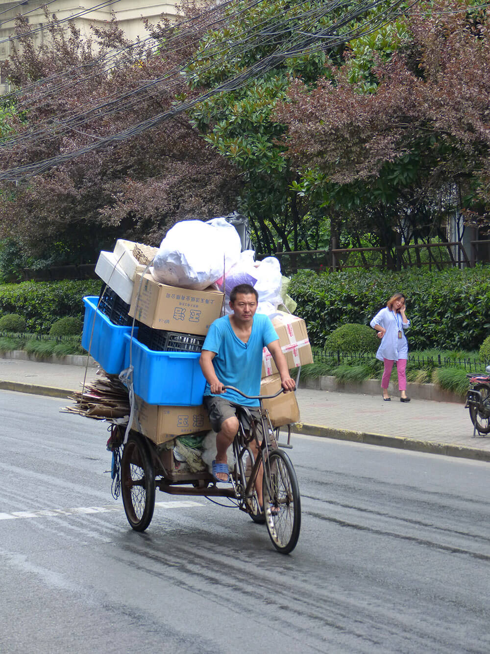 Symbolbild China 3 Mann auf Fahrrad